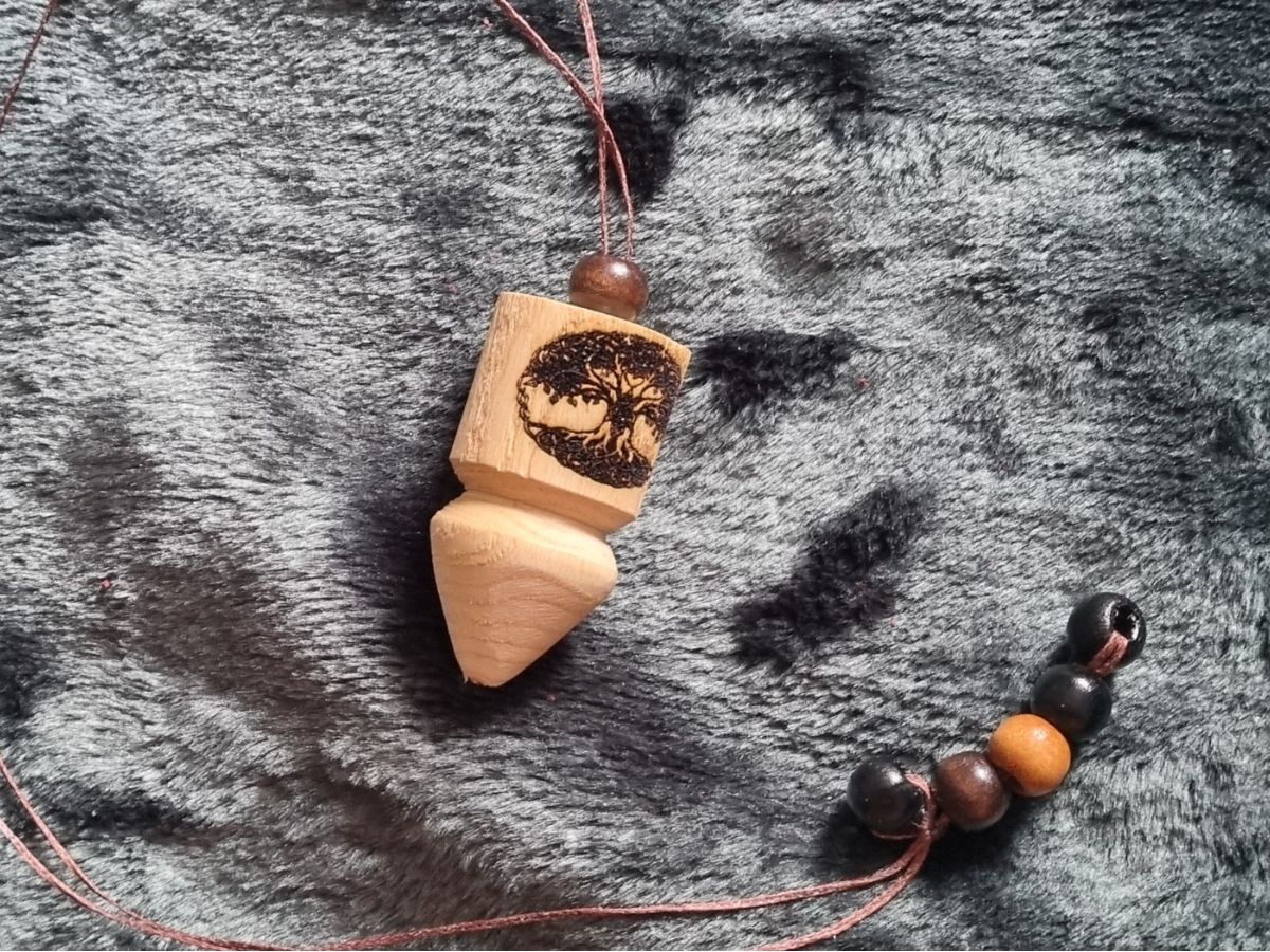 Bespoke hand-turned pendulums created at StormFallen Crafts.